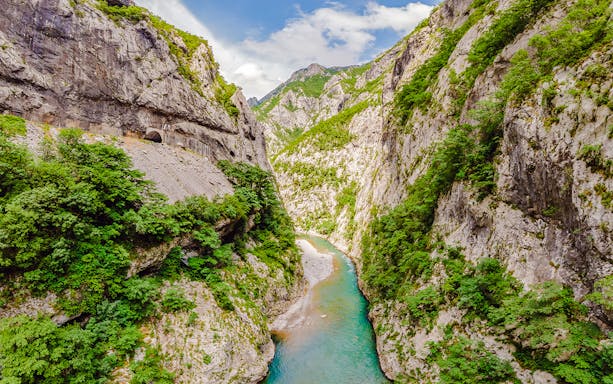 Moraca River winding through lush canyons in Montenegro.