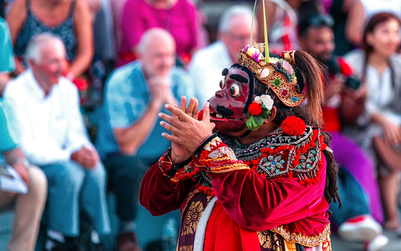 Performer in traditional costume at Ubud Kecak & Fire Dance Show, Bali.