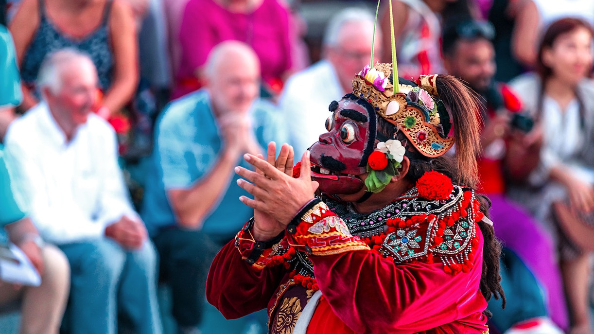 Performer in traditional costume at Ubud Kecak & Fire Dance Show, Bali.