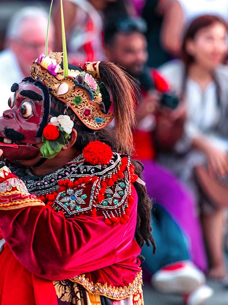 Performer in traditional costume at Ubud Kecak & Fire Dance Show, Bali.