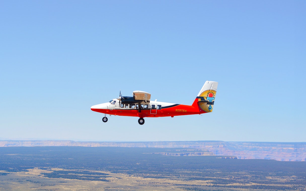 Twin Otter aircraft flying over the Grand Canyon, Arizona.