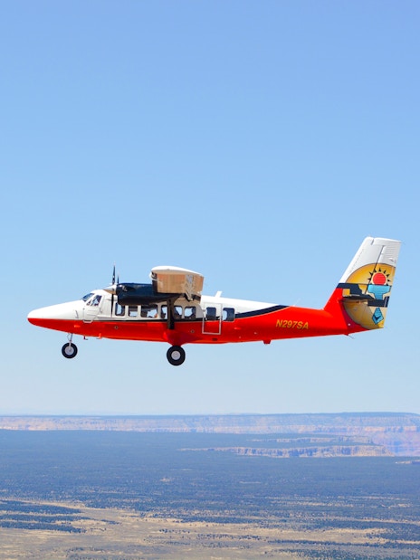 Twin Otter aircraft flying over the Grand Canyon, Arizona.