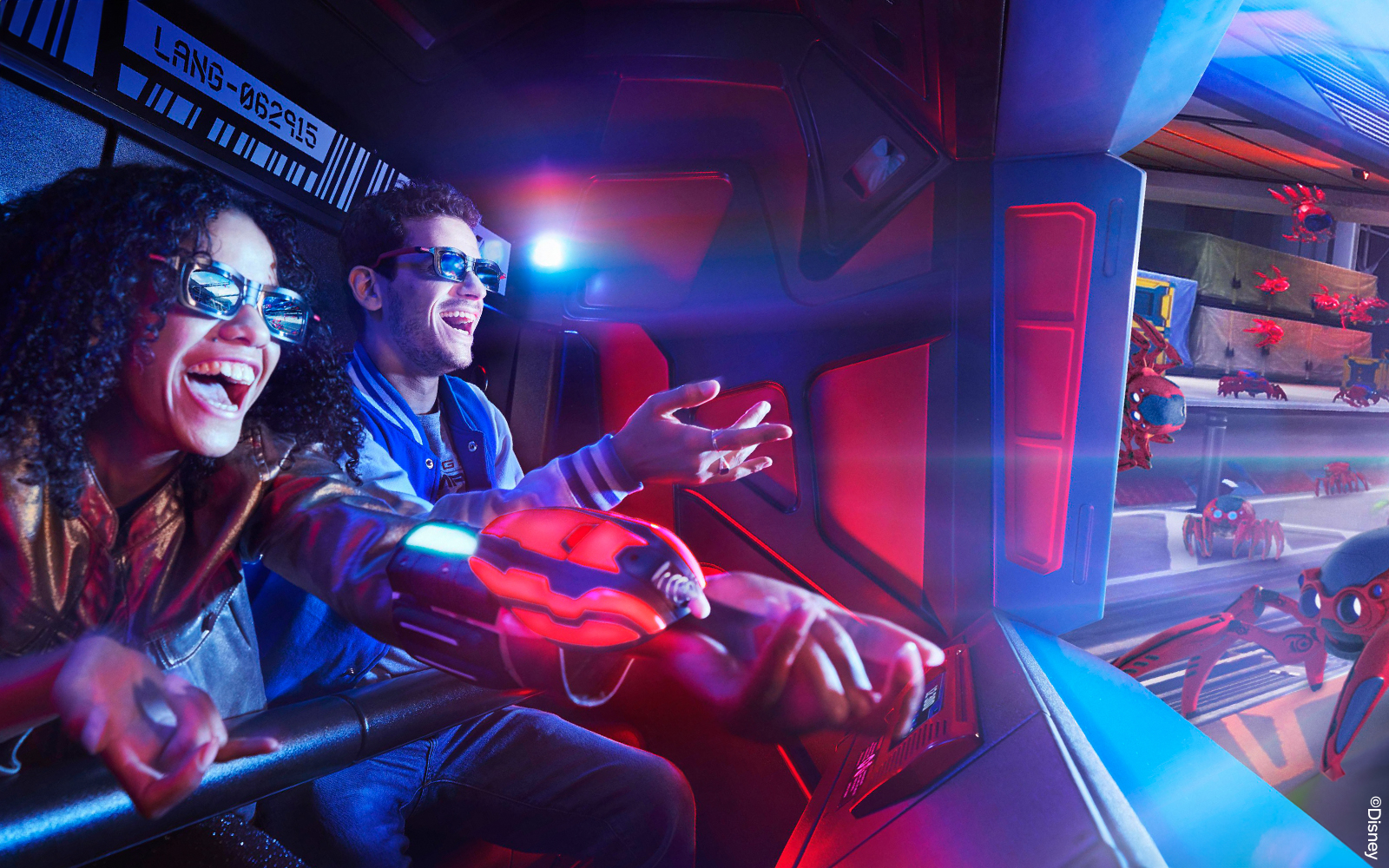 Visitors enjoying a 3D interactive ride at Disneyland® Paris.