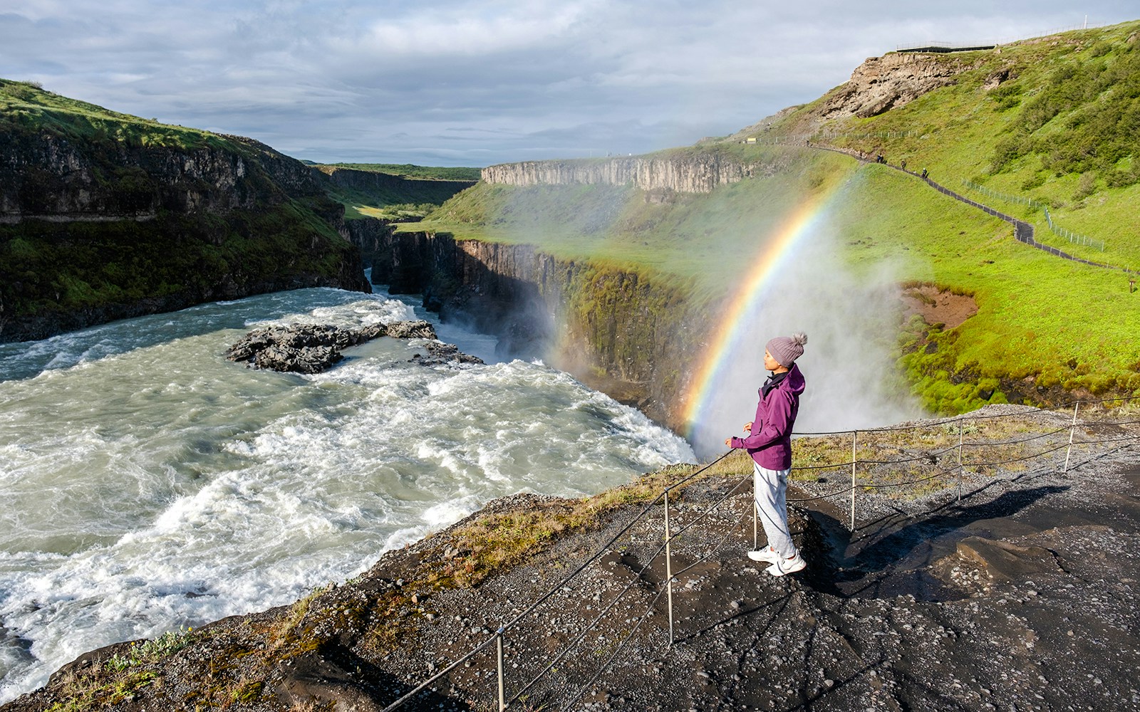 Iceland’s iconic trio: Þingvellir National Park, Geysir hot springs, and Gullfoss waterfall, all bathed in starlight.