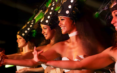 Hula dancers performing at Luau Kalamaku, Hawaii.