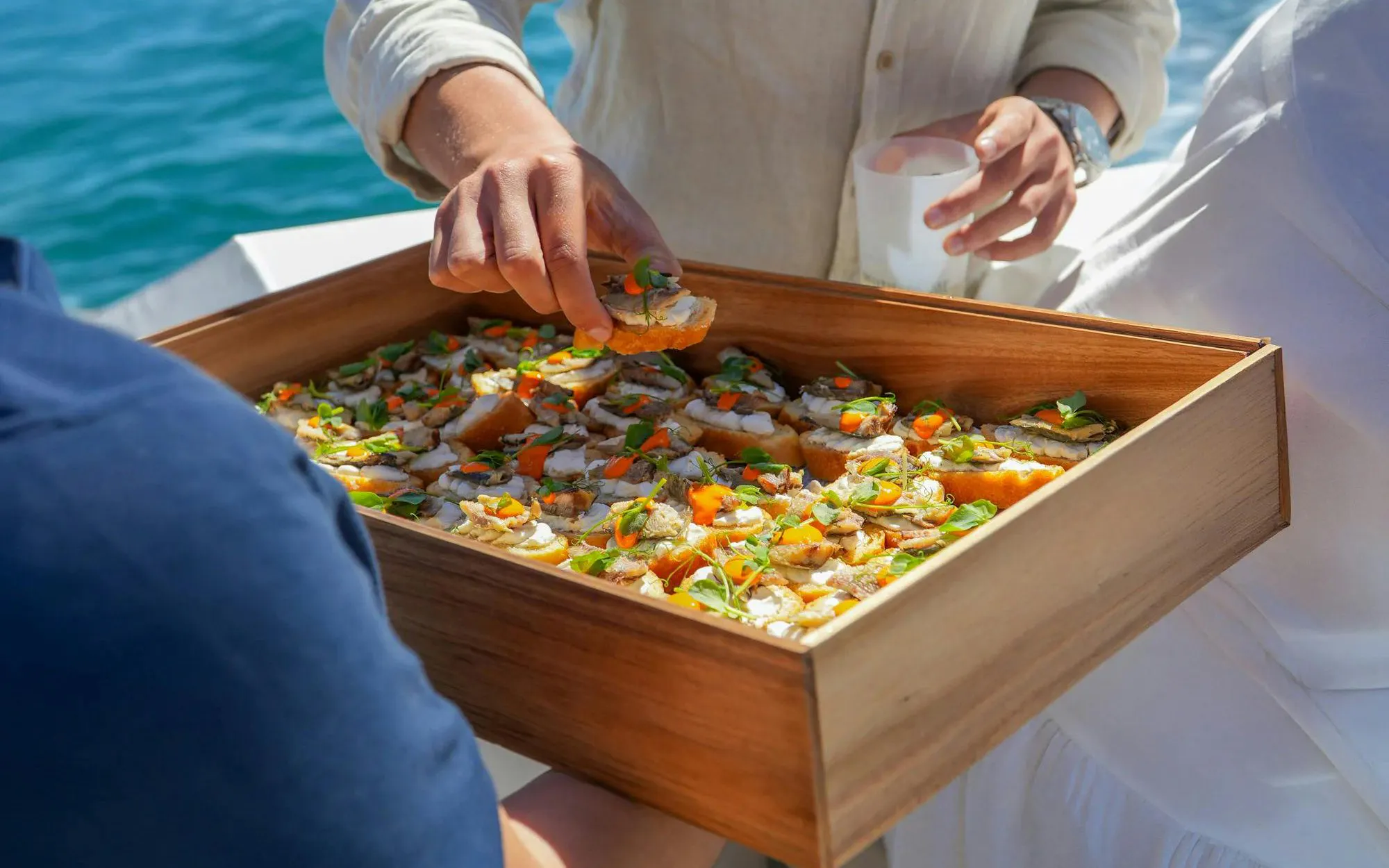 Canapés served on a boat during Vilamoura brunch tour in Algarve.