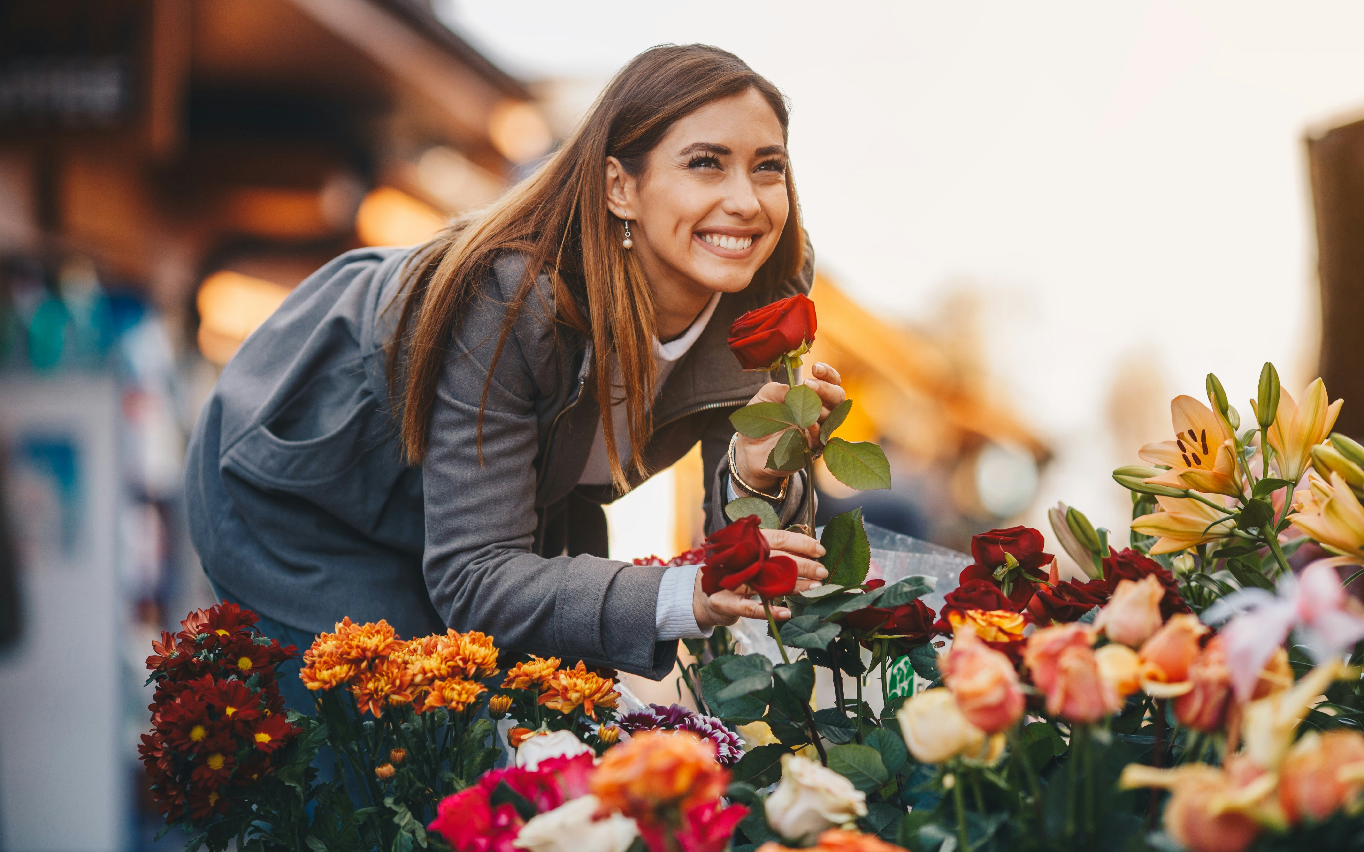 Woman smelling roses 