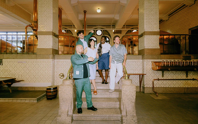 Visitors taking a selfie inside the Heineken Experience brewery in Amsterdam.