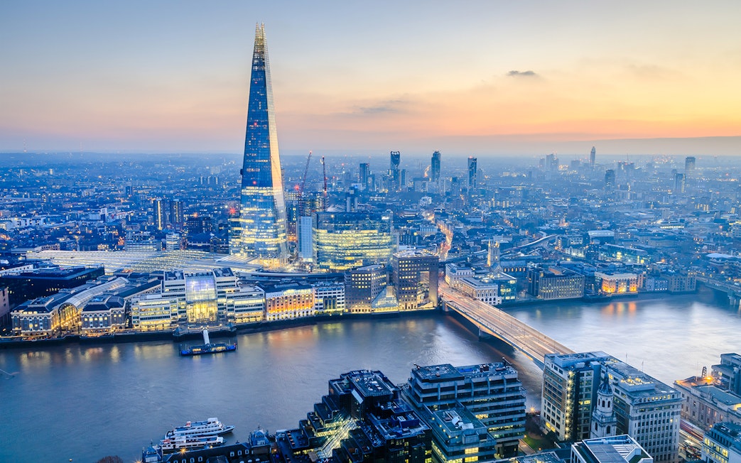 London skyline with the Shard at sunset, view over the Thames River.