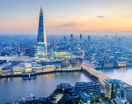 London skyline with the Shard at sunset, view over the Thames River.