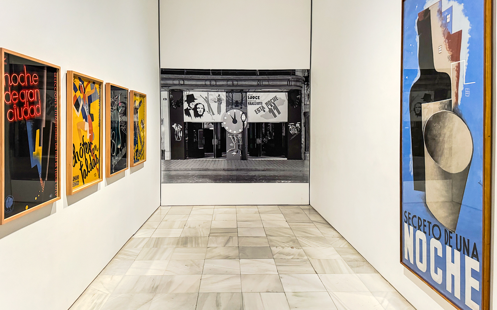 Art posters in a gallery at Reina Sofia Museum, Madrid, during guided tour.