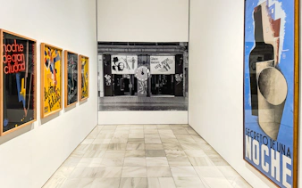 Art posters in a gallery at Reina Sofia Museum, Madrid, during guided tour.