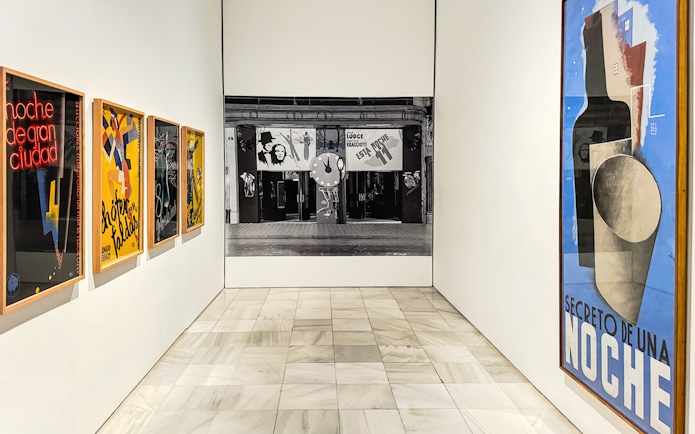 Art posters in a gallery at Reina Sofia Museum, Madrid, during guided tour.