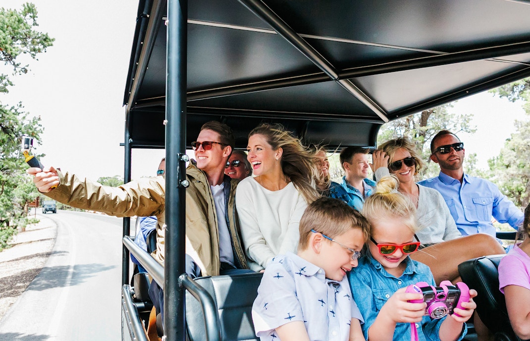 Guests on the Hummer on 2-hour tour, showcasing rugged landscape and unique rock formations.