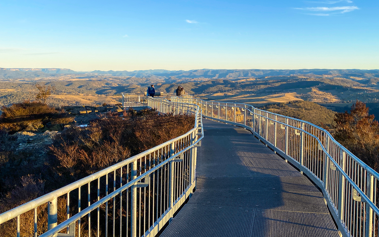 Boardwalk at Scenic World overlooking Blue Mountains landscape.
