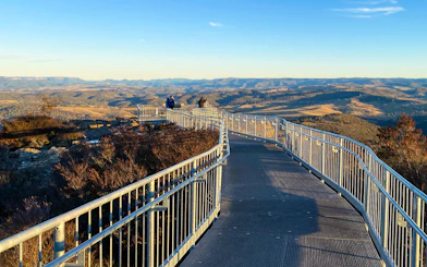 Boardwalk at Scenic World overlooking Blue Mountains landscape.