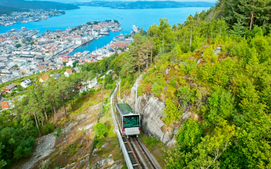 Funicular ascending Mount Floyen with panoramic view of Bergen, Norway.