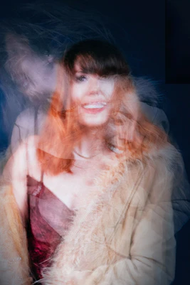 Blackout Songs play poster with blurred woman, directed by Guy Jones
