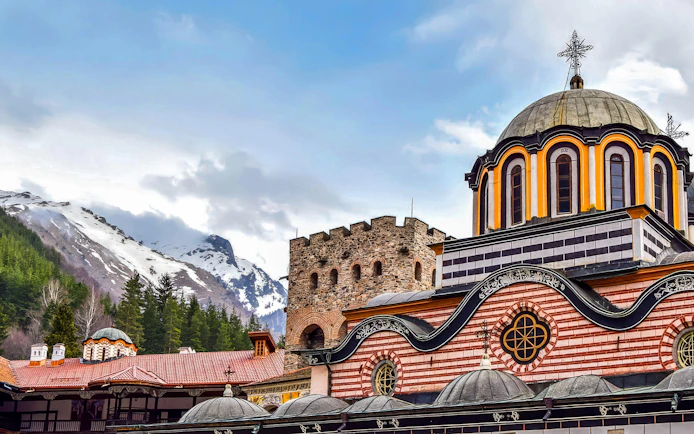 Rila Monastery with snow-capped mountains in the background, Sofia, Bulgaria.
