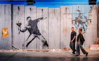 Street art mural on a guided walking tour in Madrid.