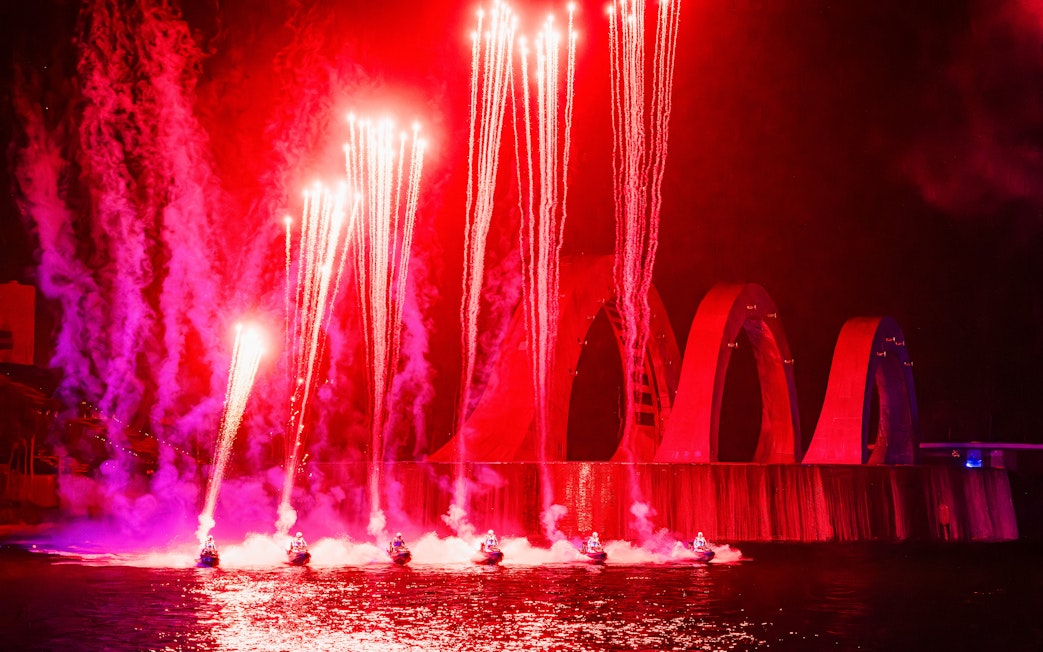 Fireworks and performers on jet skis at Symphony of the Sea show.