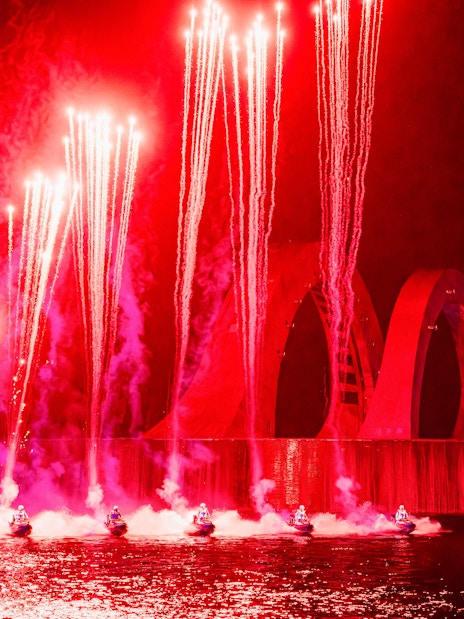 Fireworks and performers on jet skis at Symphony of the Sea show.