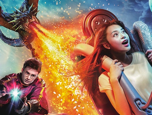 Universal Studios Japan ride with dragon and castle scene in Osaka.