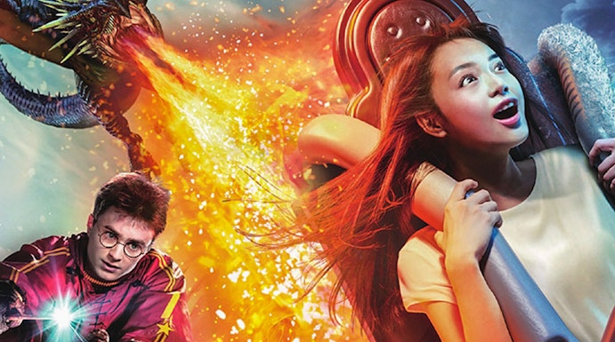 Universal Studios Japan ride with dragon and castle scene in Osaka.