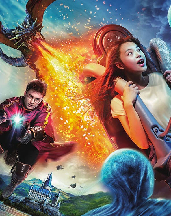 Universal Studios Japan ride with dragon and castle scene in Osaka.