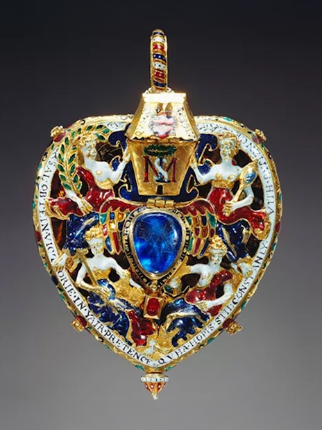 Ornate jeweled pendant with blue stone at Palace of Holyroodhouse.
