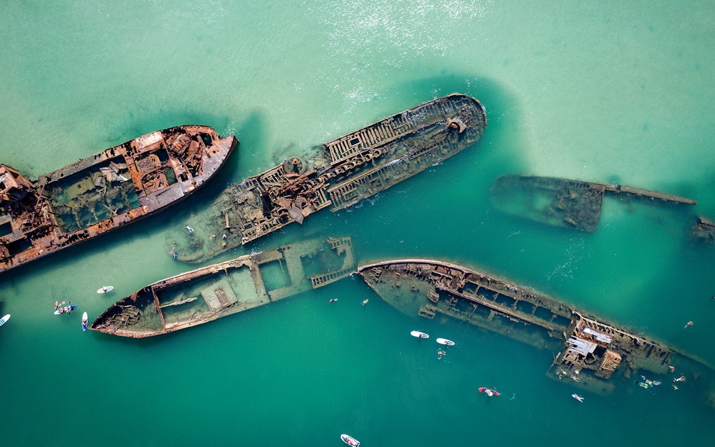 Birds-eye view of Tangalooma Shipwrecks in turquoise waters, Brisbane, Australia.