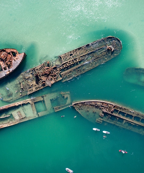 Birds-eye view of Tangalooma Shipwrecks in turquoise waters, Brisbane, Australia.