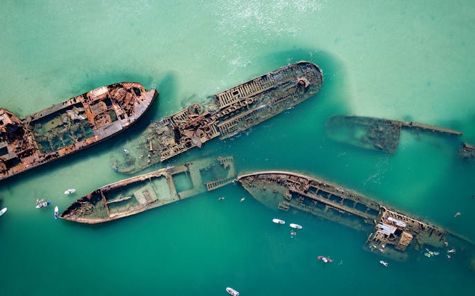Birds-eye view of Tangalooma Shipwrecks in turquoise waters, Brisbane, Australia.