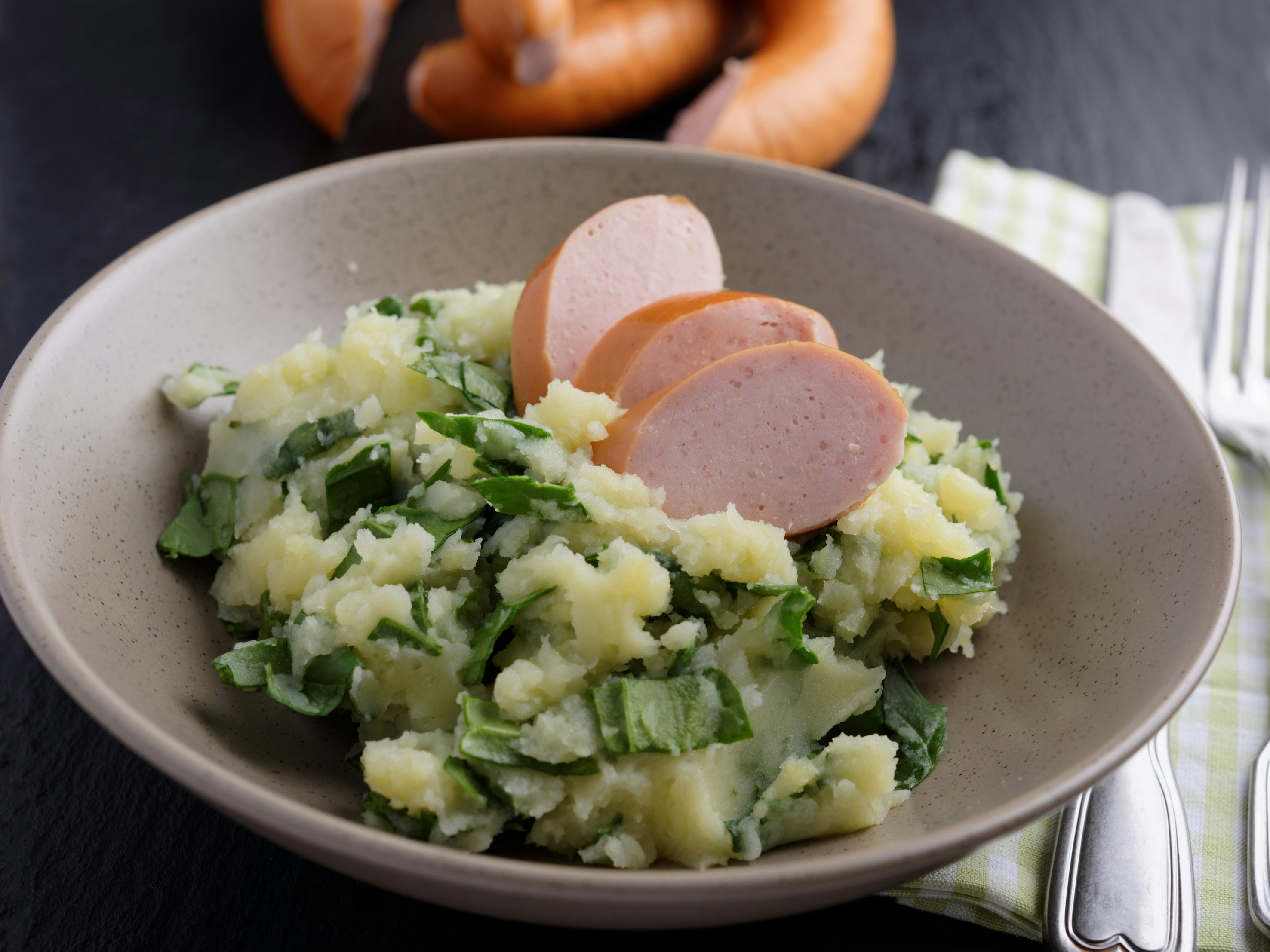 Stamppot dish with mashed potatoes, kale, and sausage in the Netherlands.