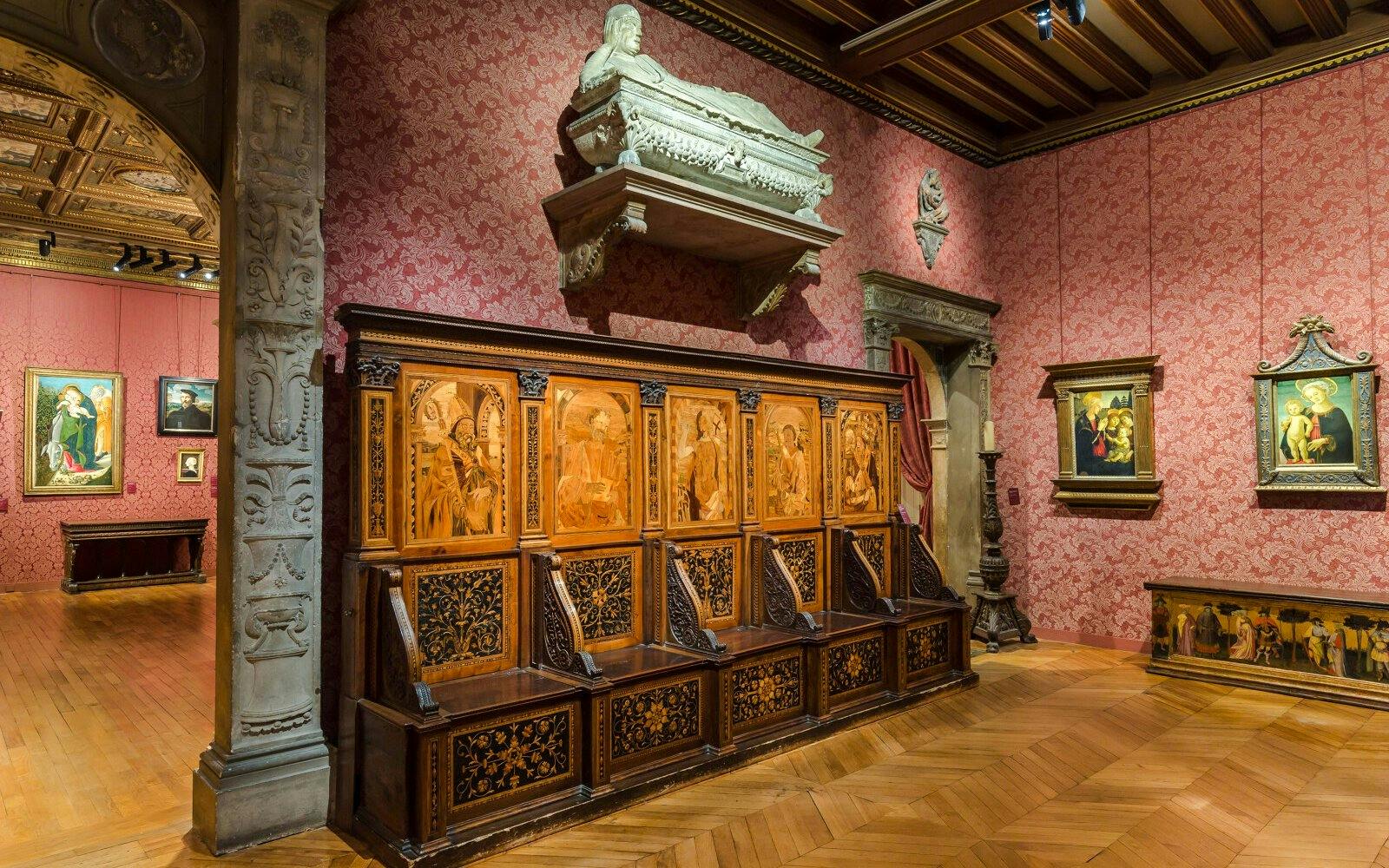 Jacquemart André Museum interior with ornate wooden panels and classical paintings.