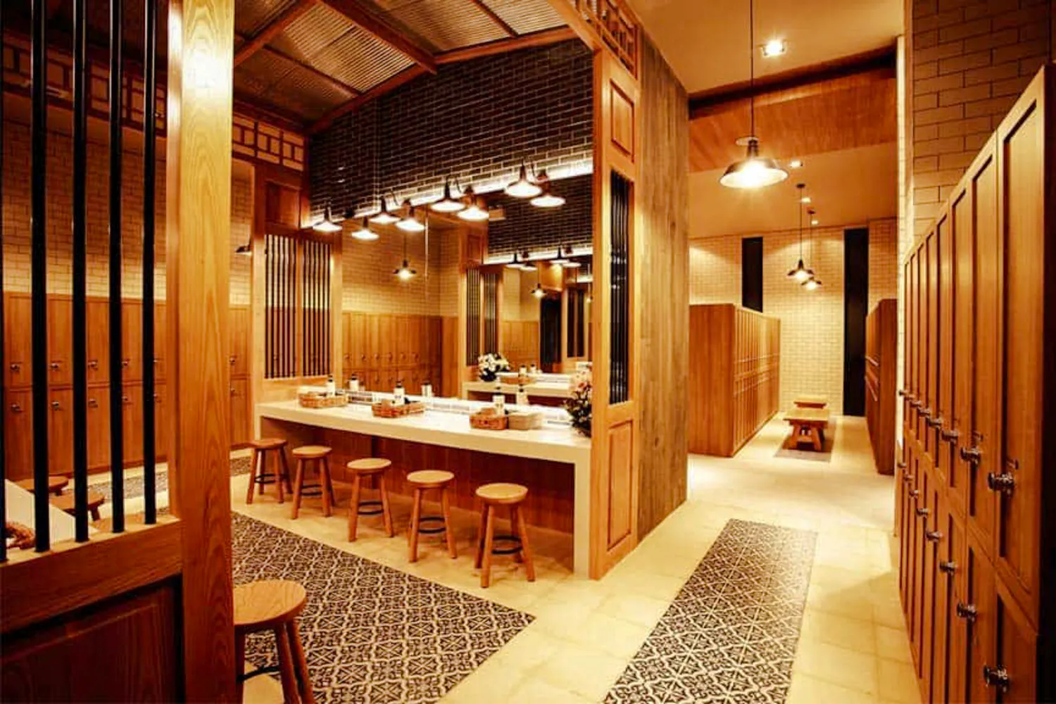 Yunomori Onsen & Spa locker room with wooden decor in Pattaya.
