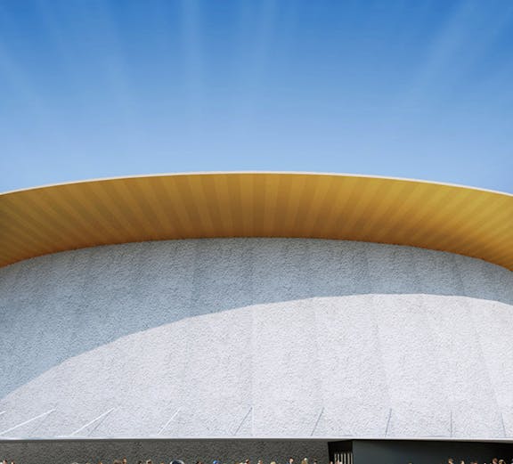 Visitors outside the Colosseum in Rome, Italy, under a clear blue sky.