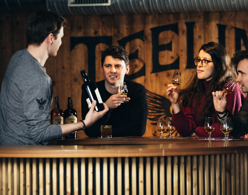 People enjoying whiskey tasting at Teeling Whiskey Distillery.