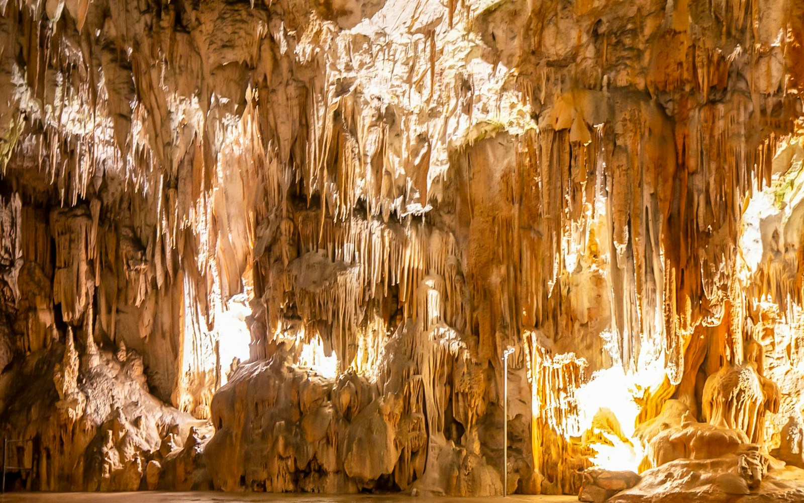Stalactites and stalagmites inside Postojna Cave, Slovenia.