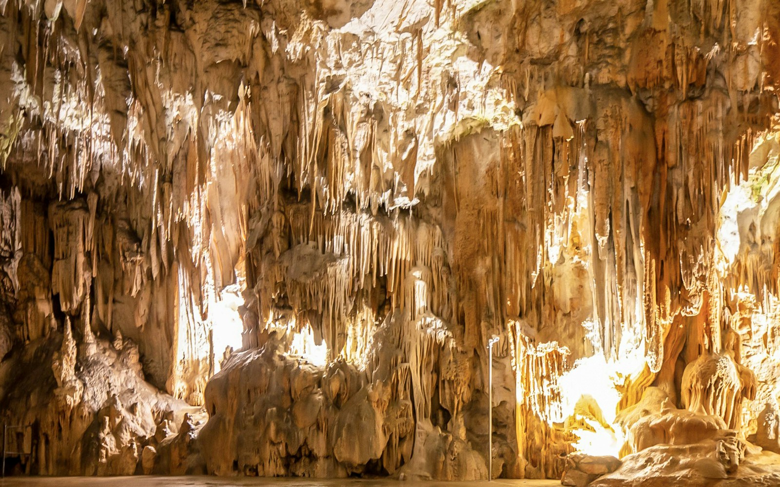 Stalactites and stalagmites inside Postojna Cave, Slovenia.
