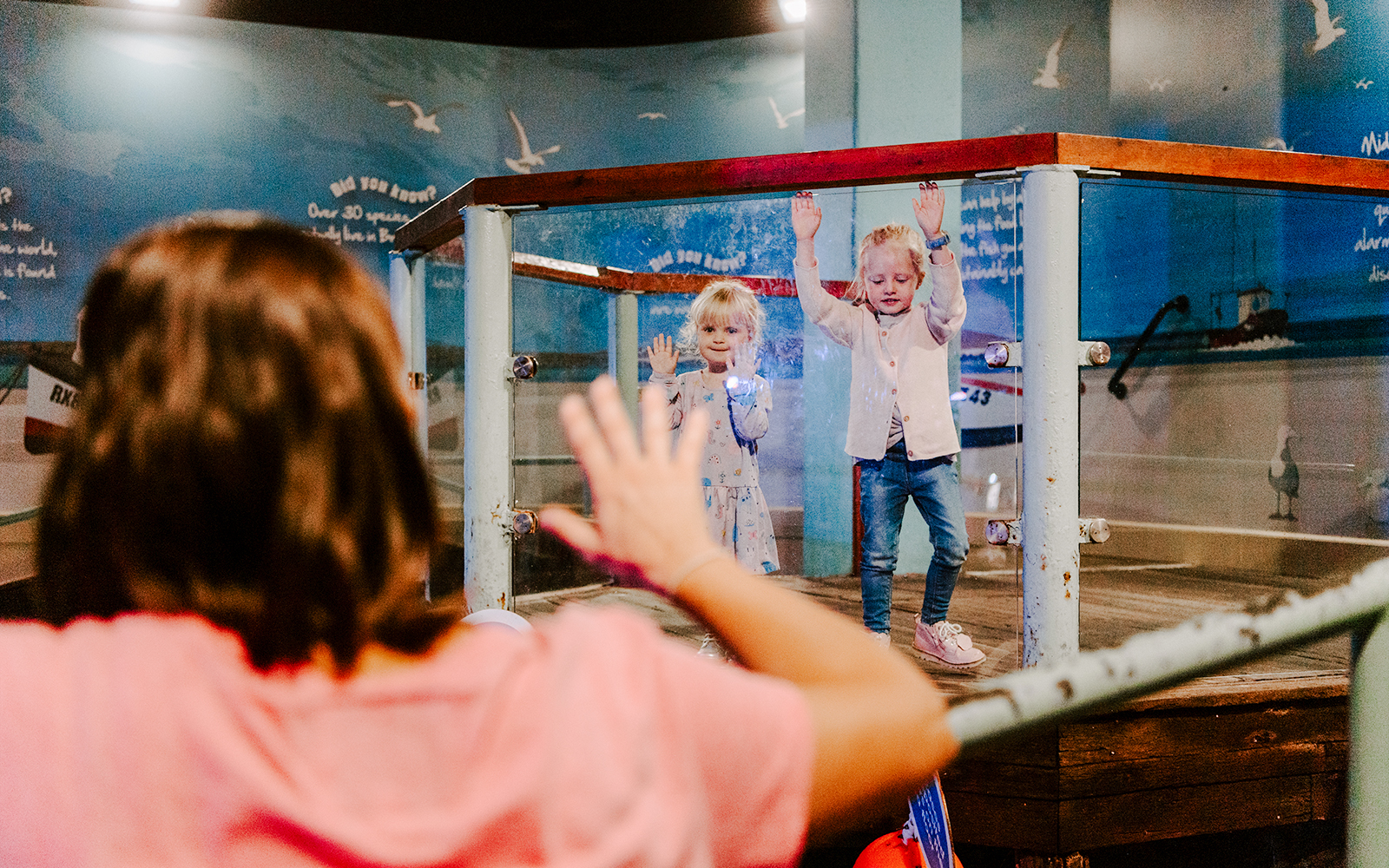 Children interacting with an exhibit at SEA Life Brighton.