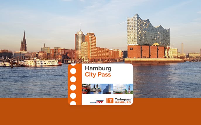 Hamburg skyline with Elbphilharmonie and city pass card in foreground.