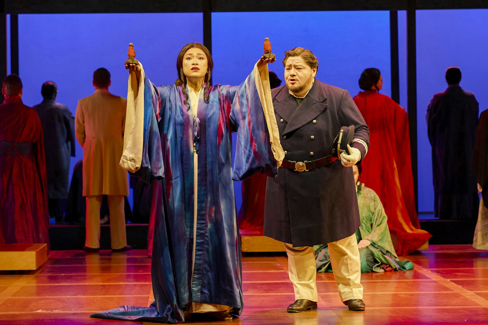 Stage performance of Madama Butterfly in Sydney with lead characters in traditional costumes.