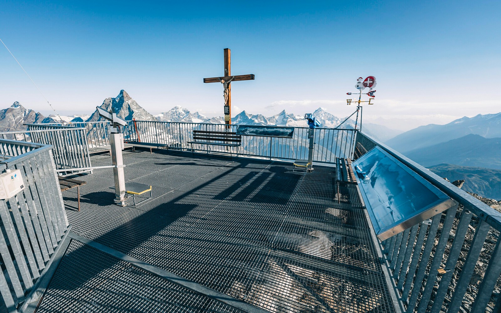 Viewing platform at Matterhorn Glacier Paradise with mountain views and observation equipment.