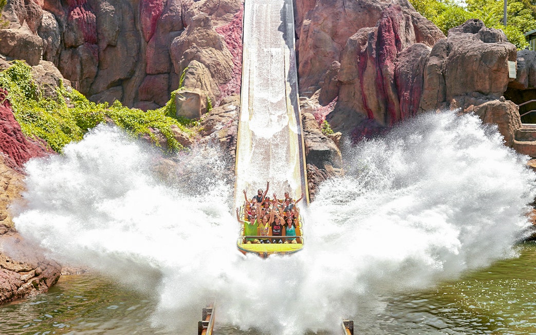 Tutuki Splash ride at PortAventura with people experiencing a water splash.