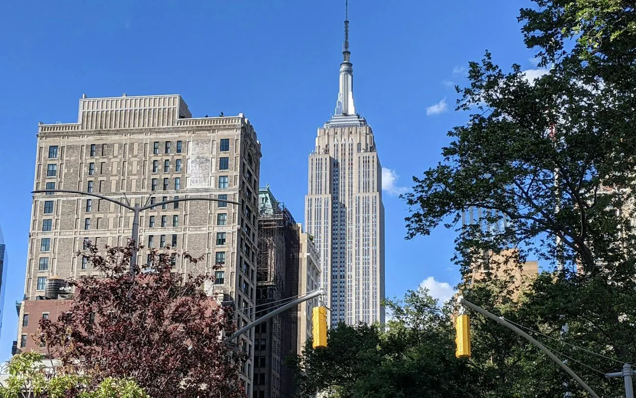 Flatiron Building and Empire State Building in New York City skyline.