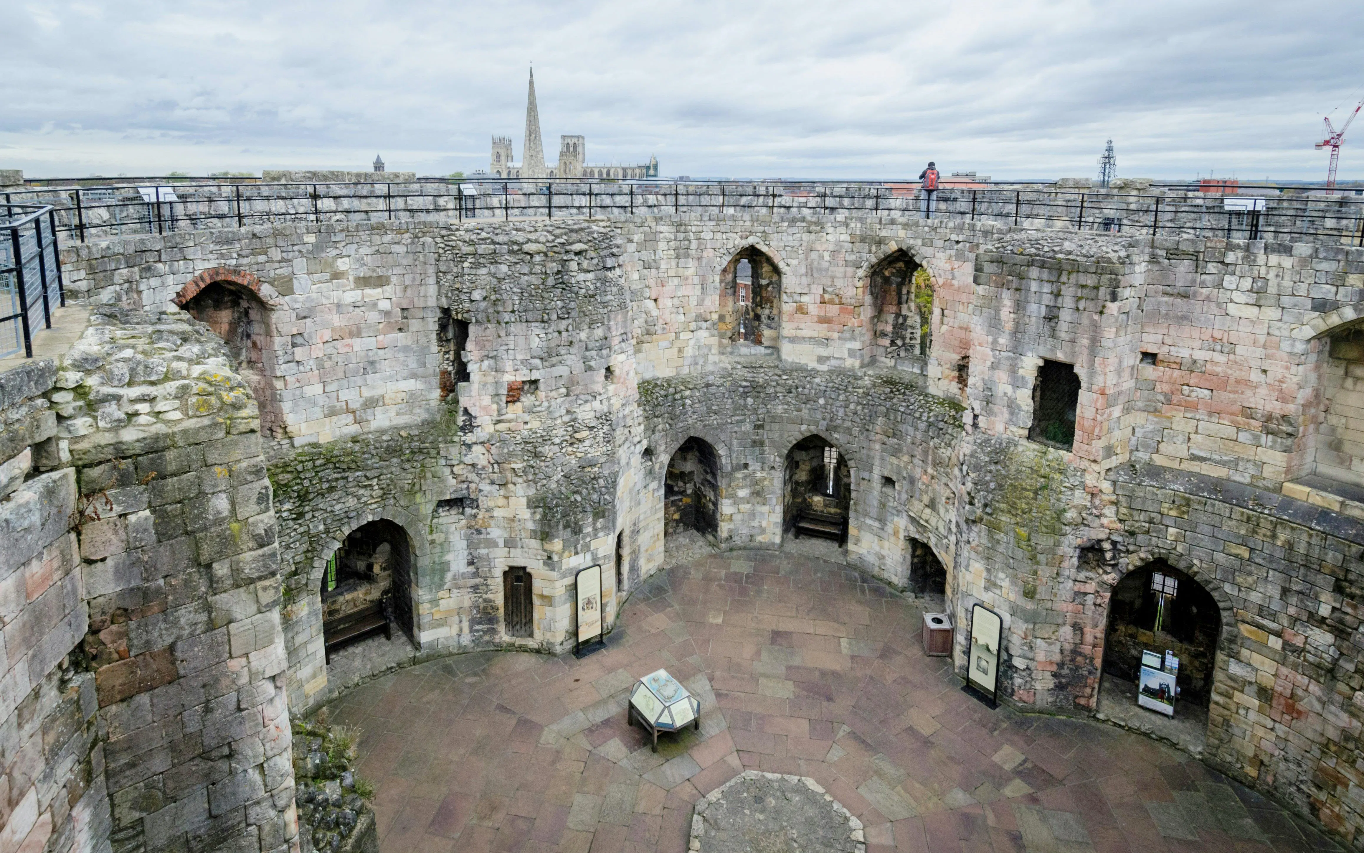 Clifford's Tower interior with stone walls and arched openings in York, England.