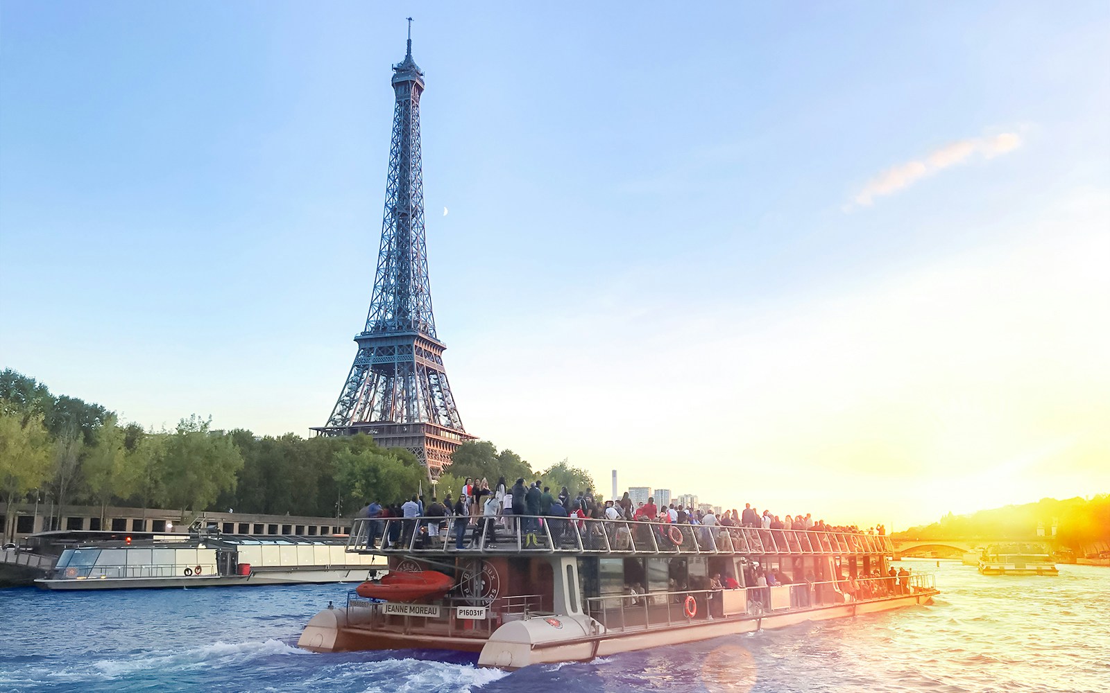 Eiffel Tower view from Seine River cruise in Paris, France.
