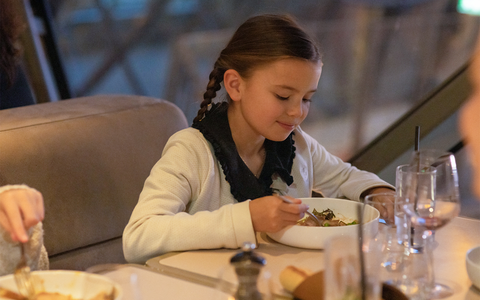 Child dining at Madame Brasserie, Eiffel Tower, Paris.