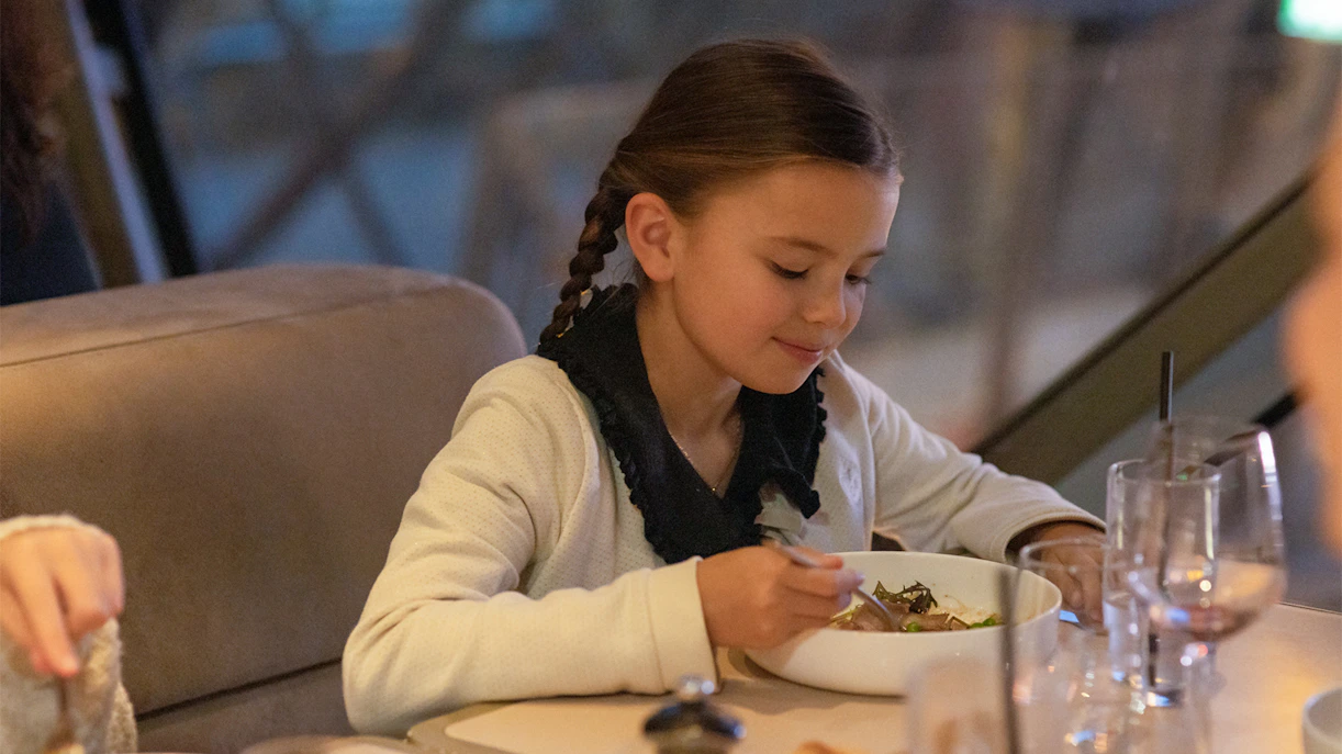 Child dining at Madame Brasserie, Eiffel Tower, Paris.